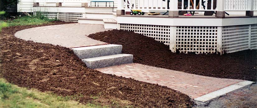 Pathways and patios by New Yard Landscaping